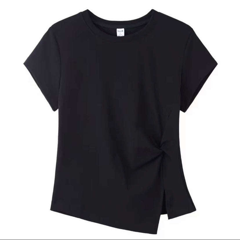 Joyjocey Classic Side-Knot Cotton T-Shirt in black with a twisted side knot and asymmetrical hem slit.