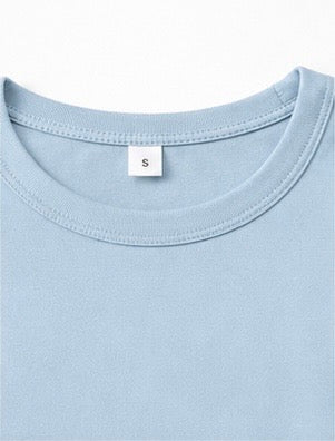Inner crew neck and size label detail of the light blue Joyjocey Classic Side-Knot Cotton T-Shirt.