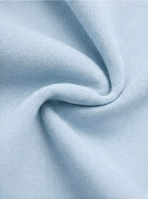 Soft light blue cotton fabric texture of the Joyjocey Classic Side-Knot Cotton T-Shirt.