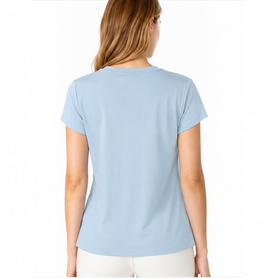 Model wearing the light blue Joyjocey Classic Side-Knot Cotton T-Shirt with white pants, back view.
