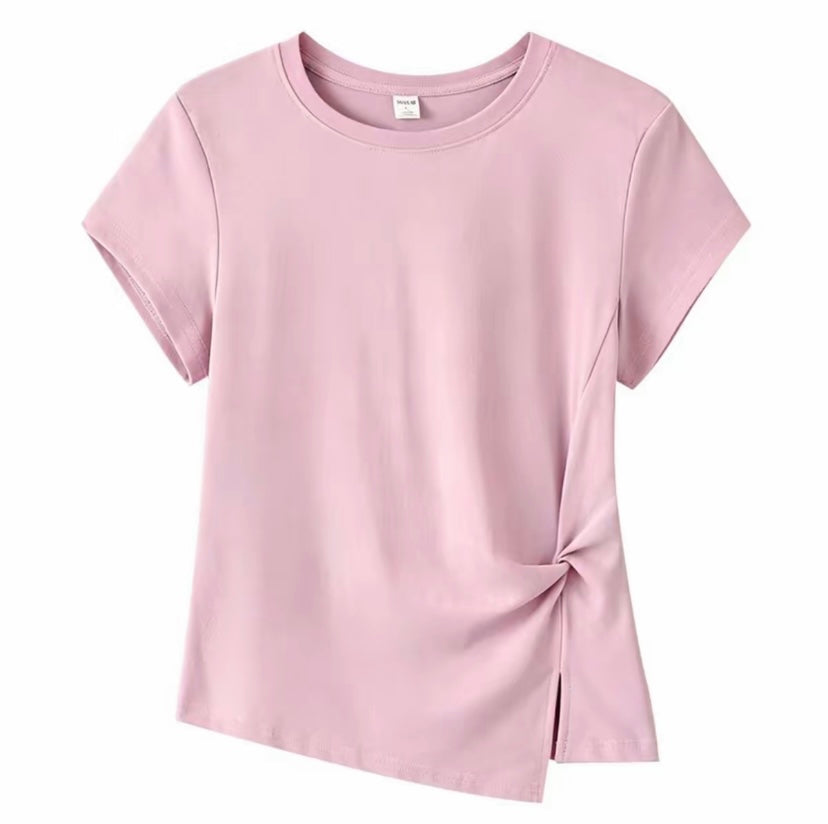 Joyjocey Classic Side-Knot Cotton T-Shirt in light pink with a twisted side knot and slit hem.