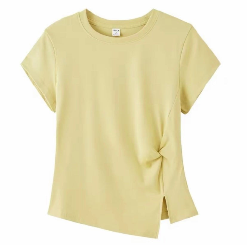 Joyjocey Classic Side-Knot Cotton T-Shirt in pale yellow with a front side knot and split hem.