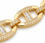 Close-up of the pave crystals, baguette-cut stones and polished oval links on the Joyjocey Gold-Plated Crystal Link Bracelet.
