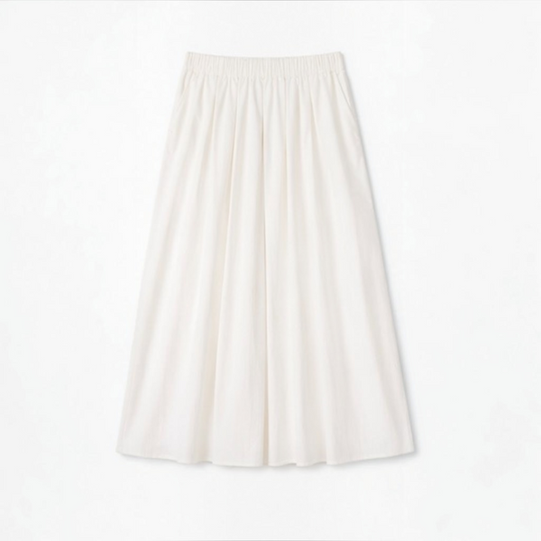 Joyjocey High-Waist Pleated A-Line Skirt in creamy white with an elastic waistband and flowy maxi hem, product front view.