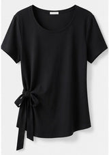 Joyjocey Side-Tie Cotton Top in black with a round neckline, short sleeves and adjustable waist tie, product front view.